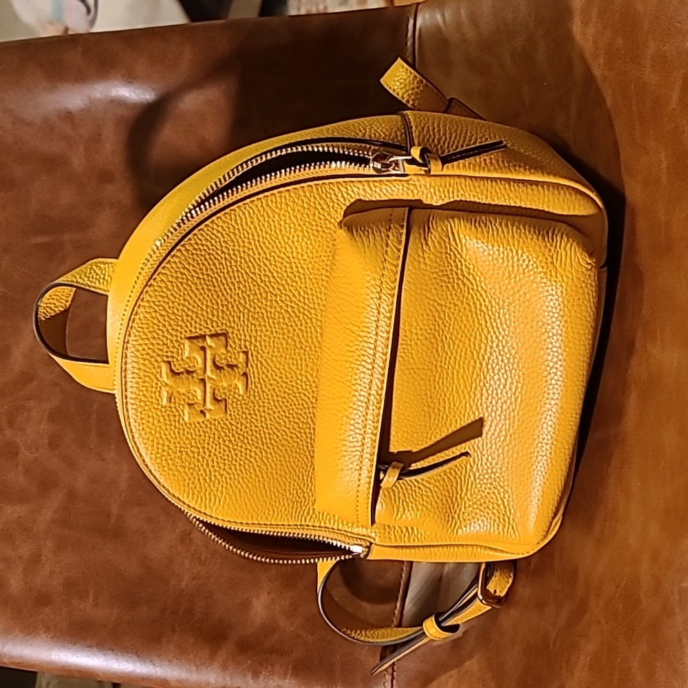 Beautiful yellow tory burch backpack only used a few times
